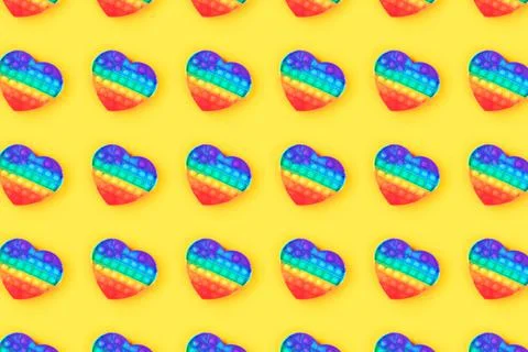 Pattern from pop it toy isolated on yellow background. Stock Photos