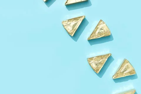 Pattern with processed cheese on blue background. Minimal creative food concept 스톡 사진