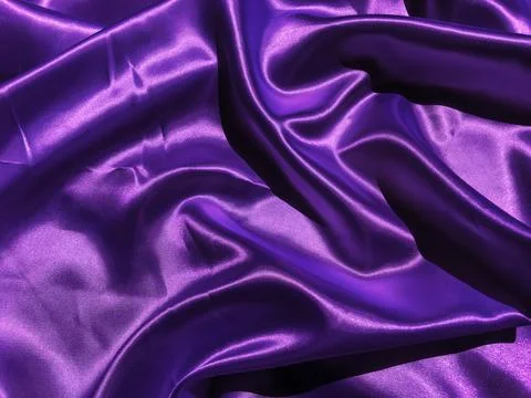 Pattern of purple fabric texture background.  wavy folds of grunge silk textu Stock-Fotos