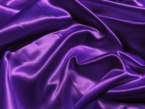 Pattern of purple fabric texture background.  wavy folds of grunge silk textu Stock-Fotos