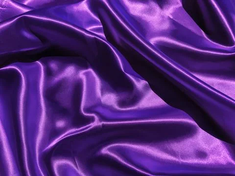 Pattern of purple fabric texture background.  wavy folds of grunge silk textu Stock-Fotos