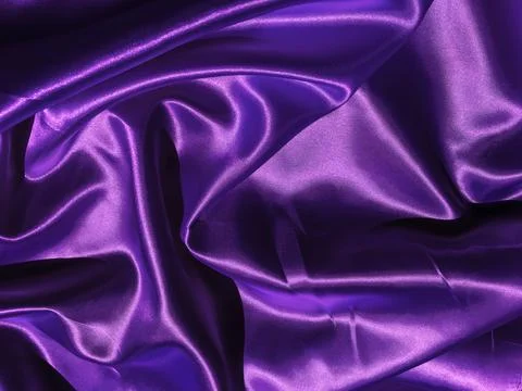 Pattern of purple fabric texture background.  wavy folds of grunge silk textu Foto stock