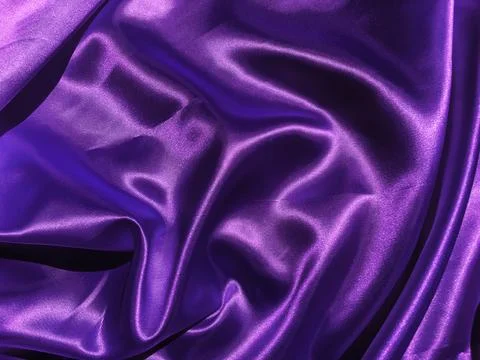 Pattern of purple fabric texture background.  wavy folds of grunge silk textu Foto stock