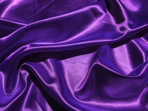 Pattern of purple fabric texture background.  wavy folds of grunge silk textu Foto stock