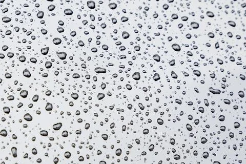 Pattern of raindrops on a metal surface Stock Photos