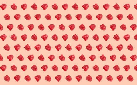 Pattern of raspberries on pale pink background Stock Photos