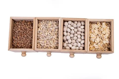 Pattern of raw cereals, beans and seeds, top view texture, mix of groats in s Stock Photos