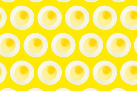 Pattern of raw eggs in bowls. Minimal creative idea concept. Stock Photos