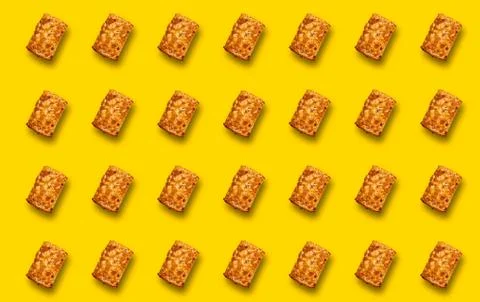 Pattern with a Rectangular cookie with a shadow on a yellow background. 스톡 사진