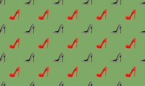 Pattern of red and black high heel shoes on green background Stock Illustration