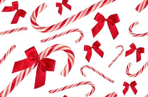 Pattern. Red candy cane and red bow. On white background. Stock Photos