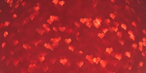 Pattern of red hearts on a purple background Stock Photos