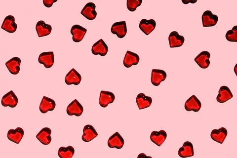 Pattern of red plastic decorative hearts Stock Photos