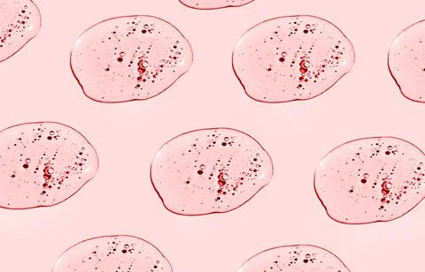 Pattern of red serum liquid drops top view Stock Photos