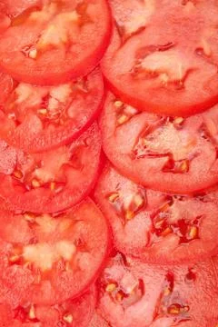 Pattern of red sliced tomatoes Stock Photos