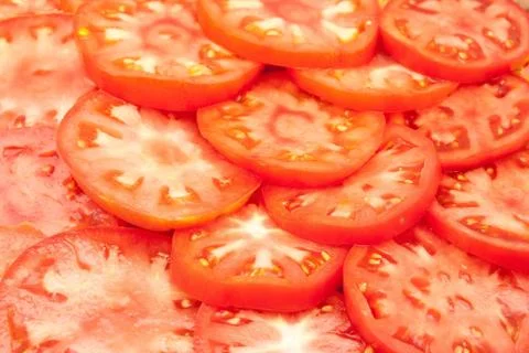 Pattern of red sliced tomatoes Stock Photos