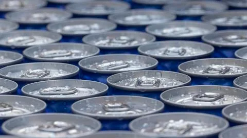 Pattern repeating of beer cans in alcohol and beverage department of supersto Stock Photos