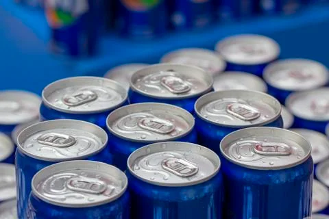 Pattern repeating of beer cans in alcohol and beverage department of supersto Stock Photos