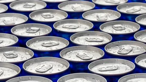 Pattern repeating of beer cans in alcohol and beverage department of supersto Stock Photos