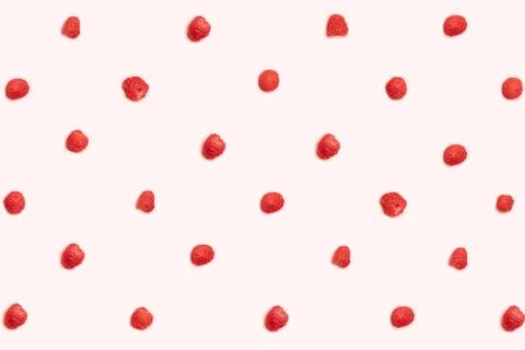 Pattern of ripe raspberries on a pink background. Can be used for blog, poste Stock Photos