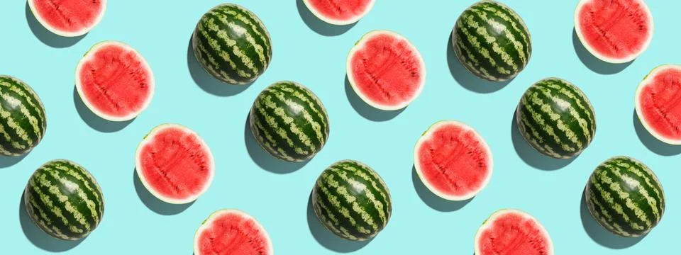 Pattern with ripe watermelon on blue background. Pop art design, creative summer Stock Photos