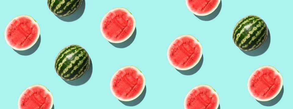 Pattern with ripe watermelon on blue background. Pop art design, creative summer Stock Photos