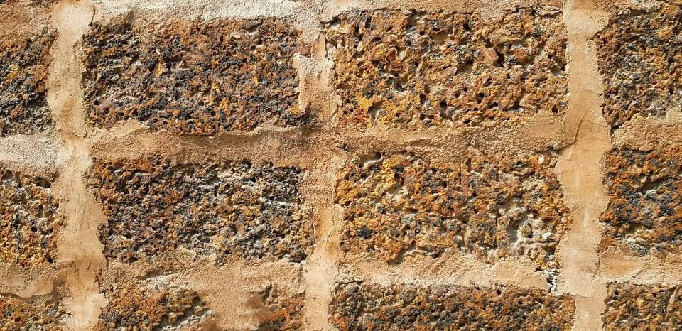 Pattern of Rough or grunge Brown cement wall for background. Art and Abstract Stock Photos