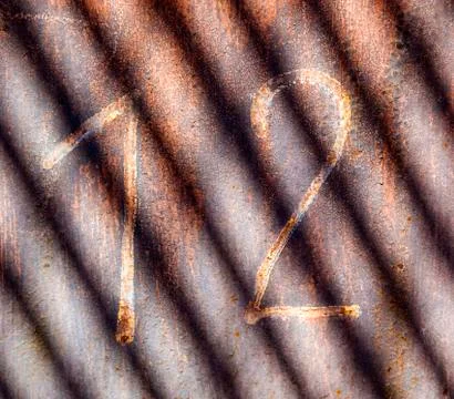 Pattern of rusty chimney with reflection of sun Stock Photos