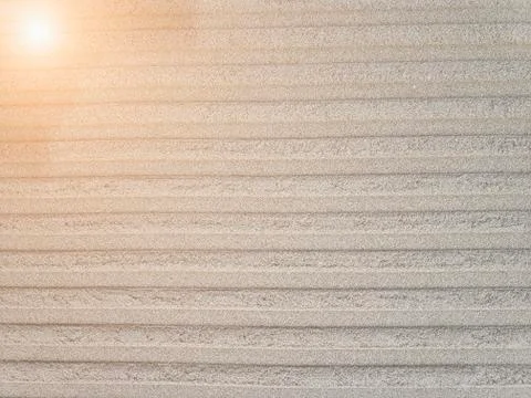 Pattern on sand after transport Stock Photos