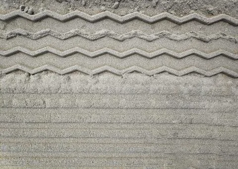Pattern on sand after transport Stock Photos