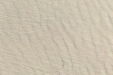 Pattern of sand at the beach in harmonic structure Stock Photos