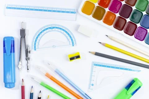 Pattern from school supplies for study, pens, pencils, rulers and paint on wh Stock Photos