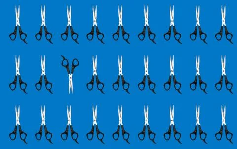 Pattern with scissors on a blue background. The concept of standing out from  Stock Illustration