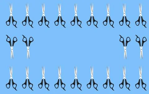 Pattern with scissors on a blue background. Stock-Fotos