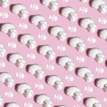 A Pattern seamless of sleeping white cat fishbone and pink background Stock Photos
