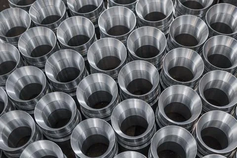 Pattern of shiny circular precision stainless steel industrial machine parts Stock Photos