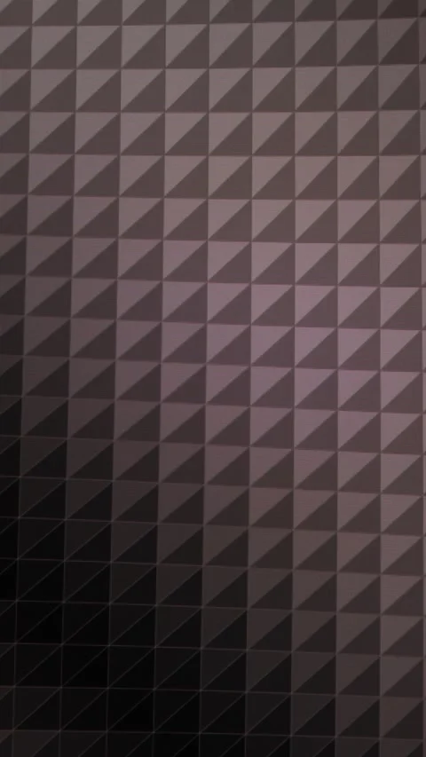 Pattern shows a geometric design with triangles on a dark background in a modern Stock Footage 330419395
