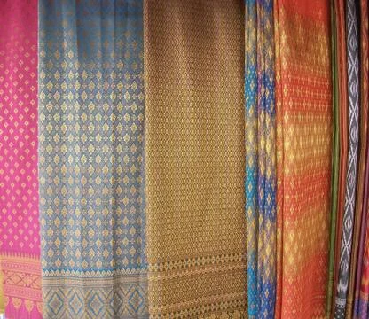 Pattern on silk for a background image. Stock Photos