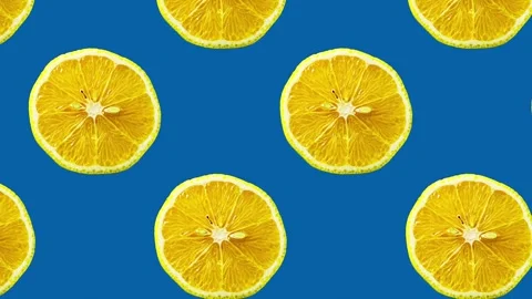 A pattern of sliced lemon fruit moving from left to right Stock Footage 243217491