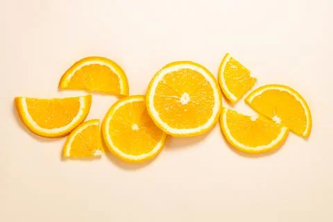 Pattern of sliced orange background. Orange fruit top view with copy space. Stock Photos