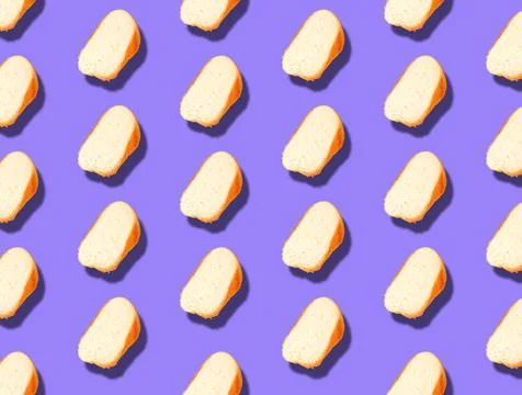 Pattern with slices of sliced white bread with a shadow. The levitation effec Stock Photos