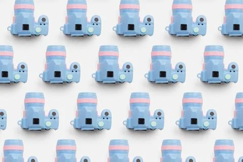 Pattern with SLR camera on pastel color background Stock Illustration