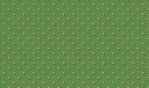 Pattern of small green and yellow birds flying in the sky Stock Illustration
