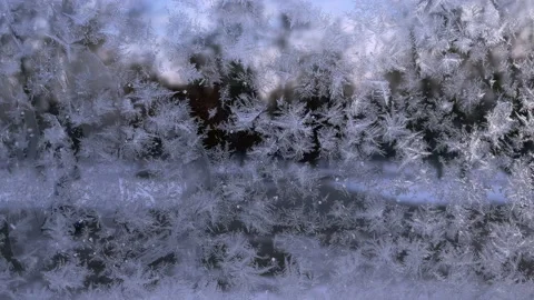 Pattern of snowflakes on glass 動画素材 223658158