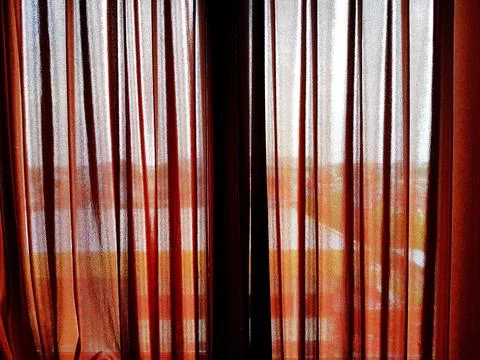 Pattern of soft red curtain, fabric or cotton hanging for background . Stock Photos