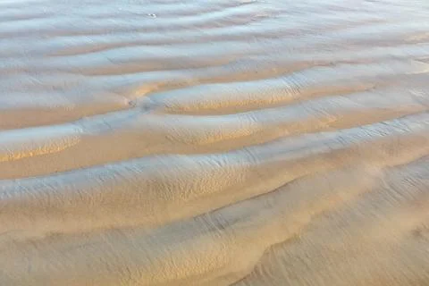 Pattern of soft waves at the beach in harmonic structure Foto stock