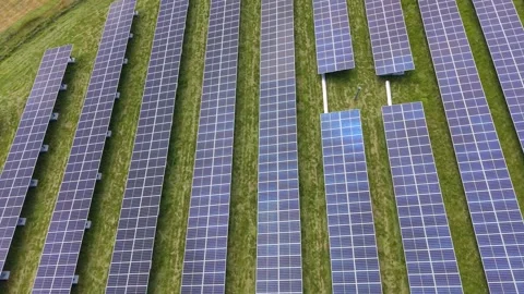Pattern of solar panels in rural field environment Stock Footage 339763430