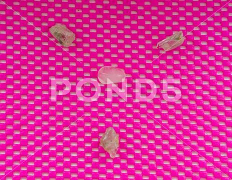 Pattern of spiritual stones, selenite and rose quartz, pink pattern backgroun Stock Photos