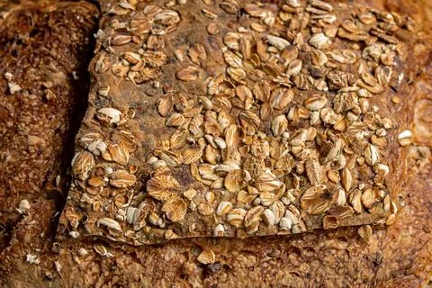 Pattern of sprinkling oats on bread rustic crunchy texture to the crust 写真素材