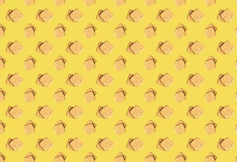 Pattern with square crackers on a yellow background. Product template. Stock Photos